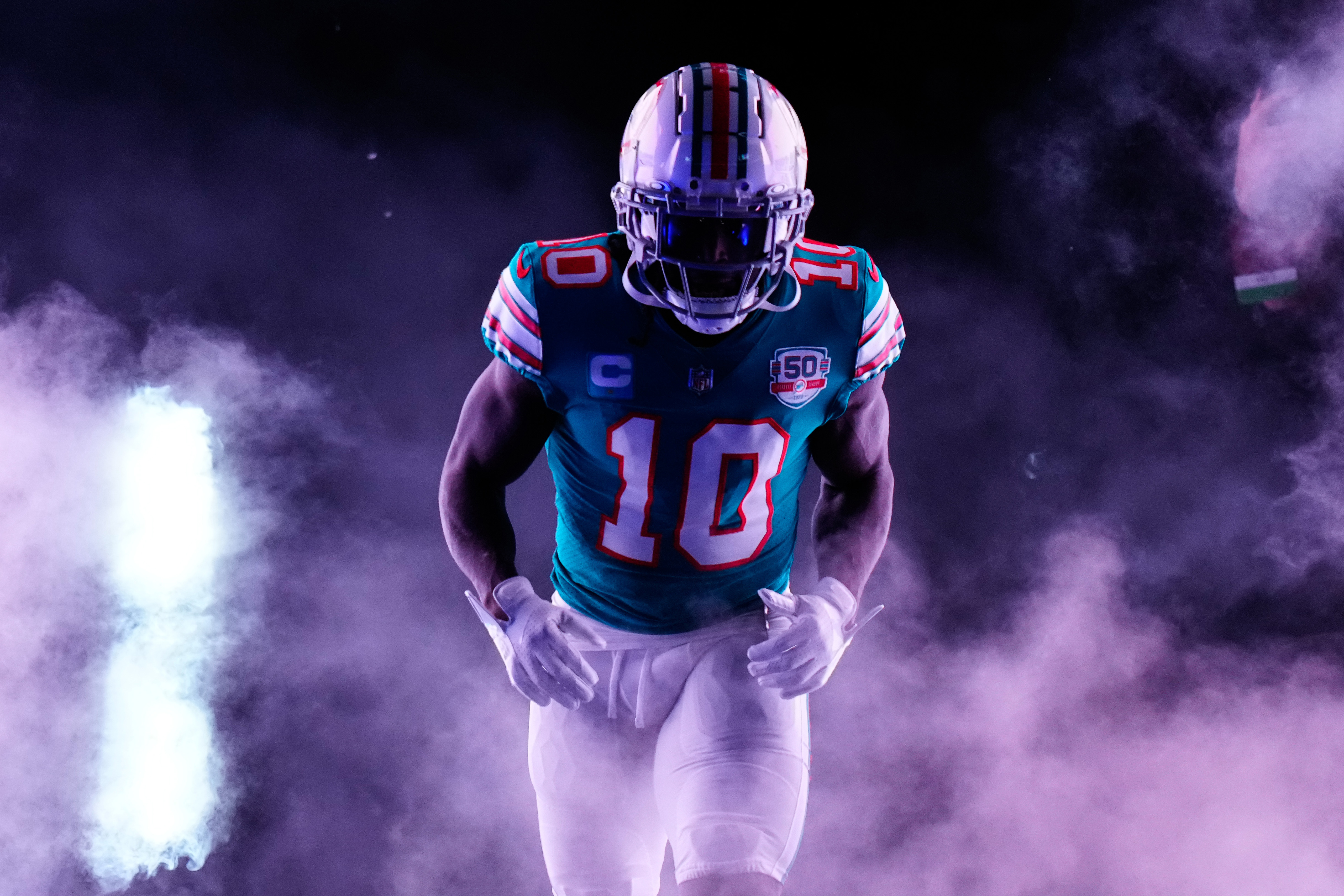 Background Tyreek Hill Wallpaper Discover more American Football League  Miami Dolphins National S  Football helmets Miami dolphins wallpaper  Football league