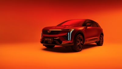 Cadillac Optiq, 2025, Electric SUV, Orange background, 5K, 8K