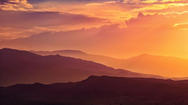 Sunset, Mountain range, Silhouette, Landscape, Orange sky, Clouds, Sun light, 5K, Wallpaper