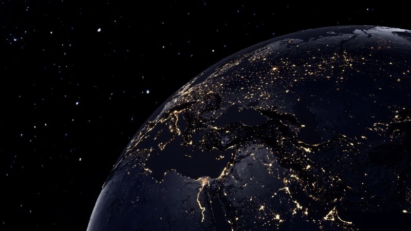 Planet earth night view illuminated orbit dark background 5k 