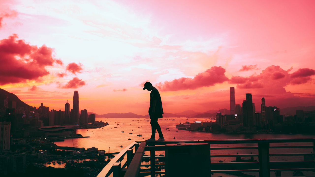 alone silhouette cityscape hong kong city pink sky