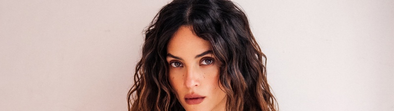 Adria Arjona background