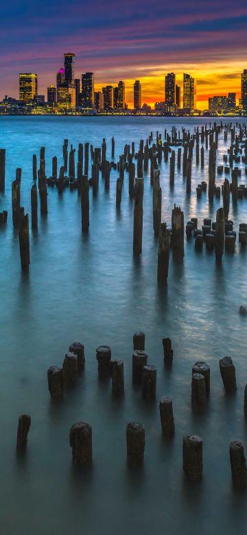 Old Pier Poles, New York City, Skyline, Cityscape, City lights, Dusk, Body of Water, Orange sky, Skyscrapers, Landscape, 5K