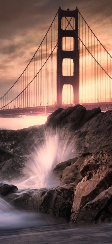 Golden Gate Bridge, California, Rocky coast, Water splash, Long exposure, Metal structure, Cloudy, Landmark, Dusk, Sunset