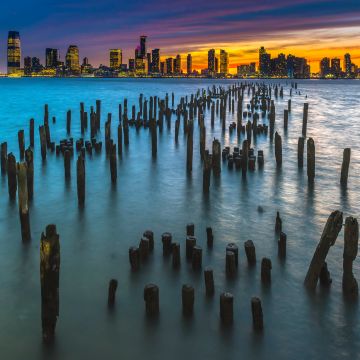 Old Pier Poles, New York City, Skyline, Cityscape, City lights, Dusk, Body of Water, Orange sky, Skyscrapers, Landscape, 5K