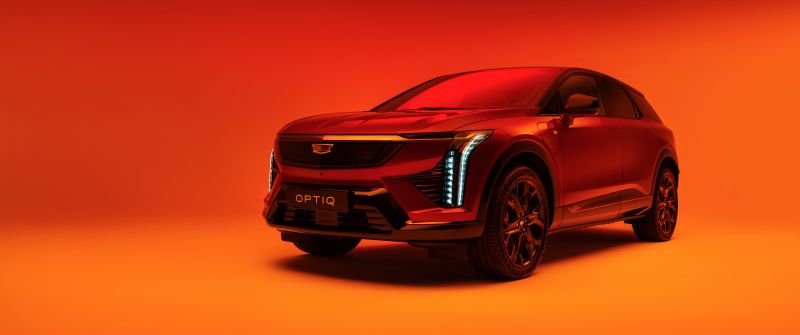 Cadillac Optiq, 2025, Electric SUV, Orange background, 5K, 8K