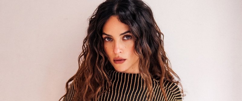 Adria Arjona background