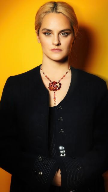 Noémie Merlant, French actress, 5K, Orange background