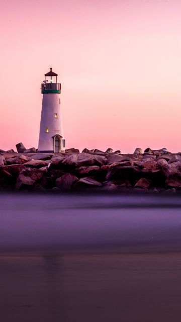 Lighthouse, Pink Hour, White, Beacon, Purple sky, Rocks, Seashore, Sunset, 5K