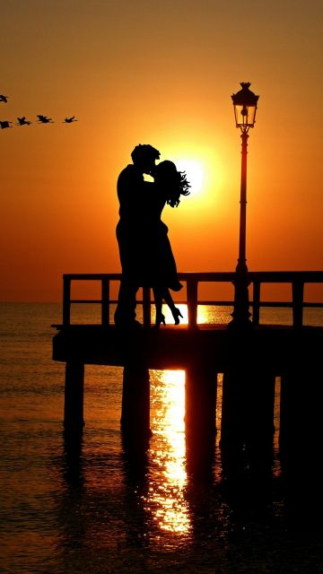 Couple, Orange sky, Romantic kiss, Sunset, Silhouette, Together, Birds, Lanterns, Sea, Reflection